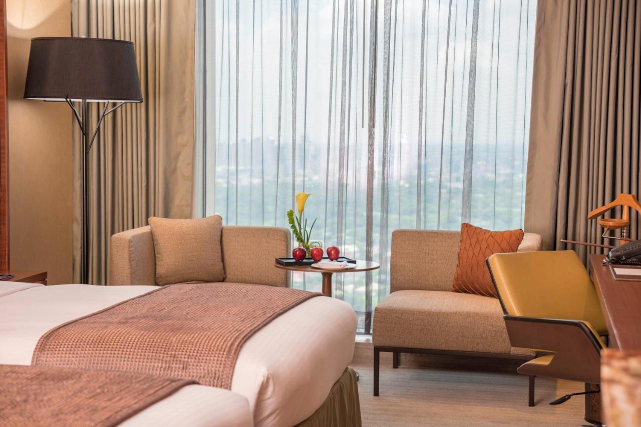 Готель Marco Polo Ortigas Manila Pasig City Екстер'єр фото